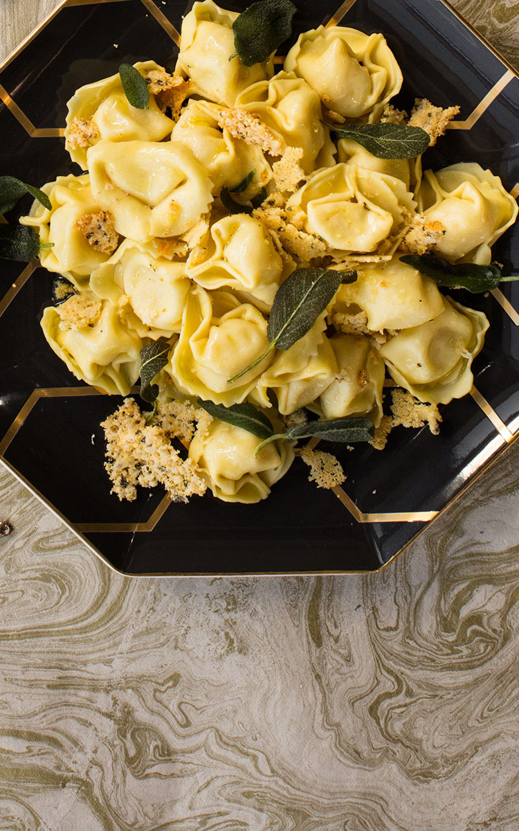 Spinach Ricotta Tortelloni With Butter Fried Sage And Corn Parmigiano Crisp La Famiglia Rana