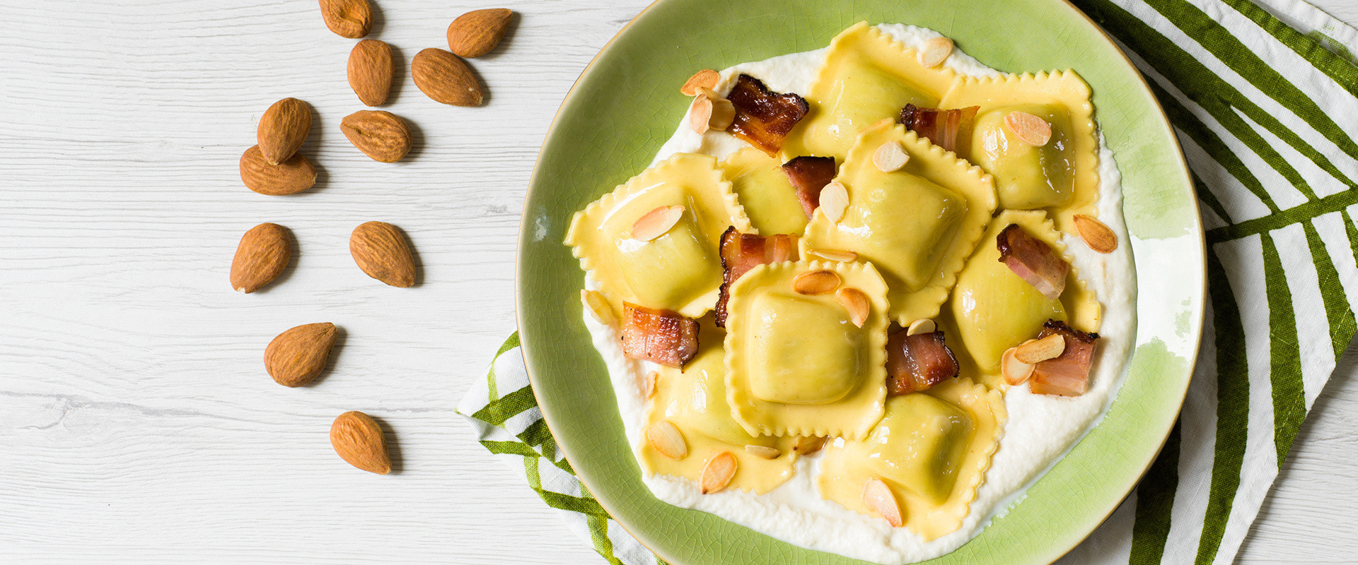 Burrata And Chards Ravioli With Toasted Almond And Pancetta Cream ...