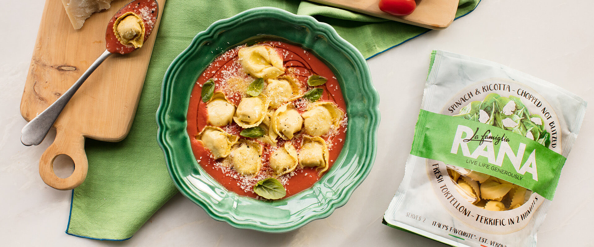 SPINACH & RICOTTA TORTELLONI IN TOMATO SAUCE AND PARMIGIANO CHEESE La