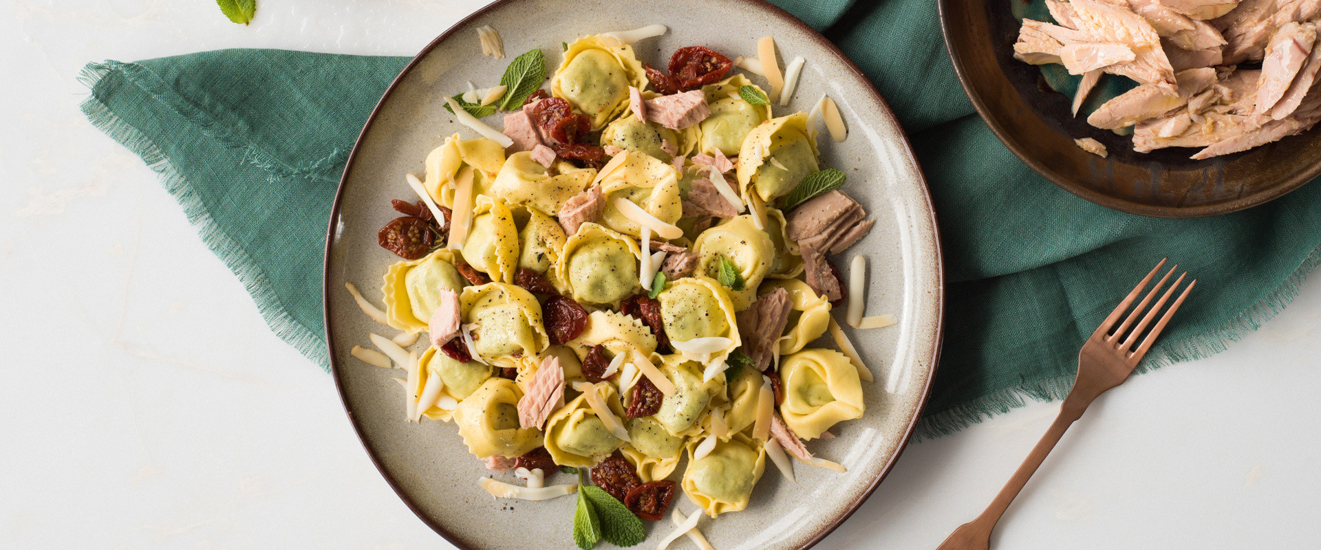 RICOTTA & SPINACH TORTELLINI WITH TUNA, DRIED TOMATOES, PROVOLONE