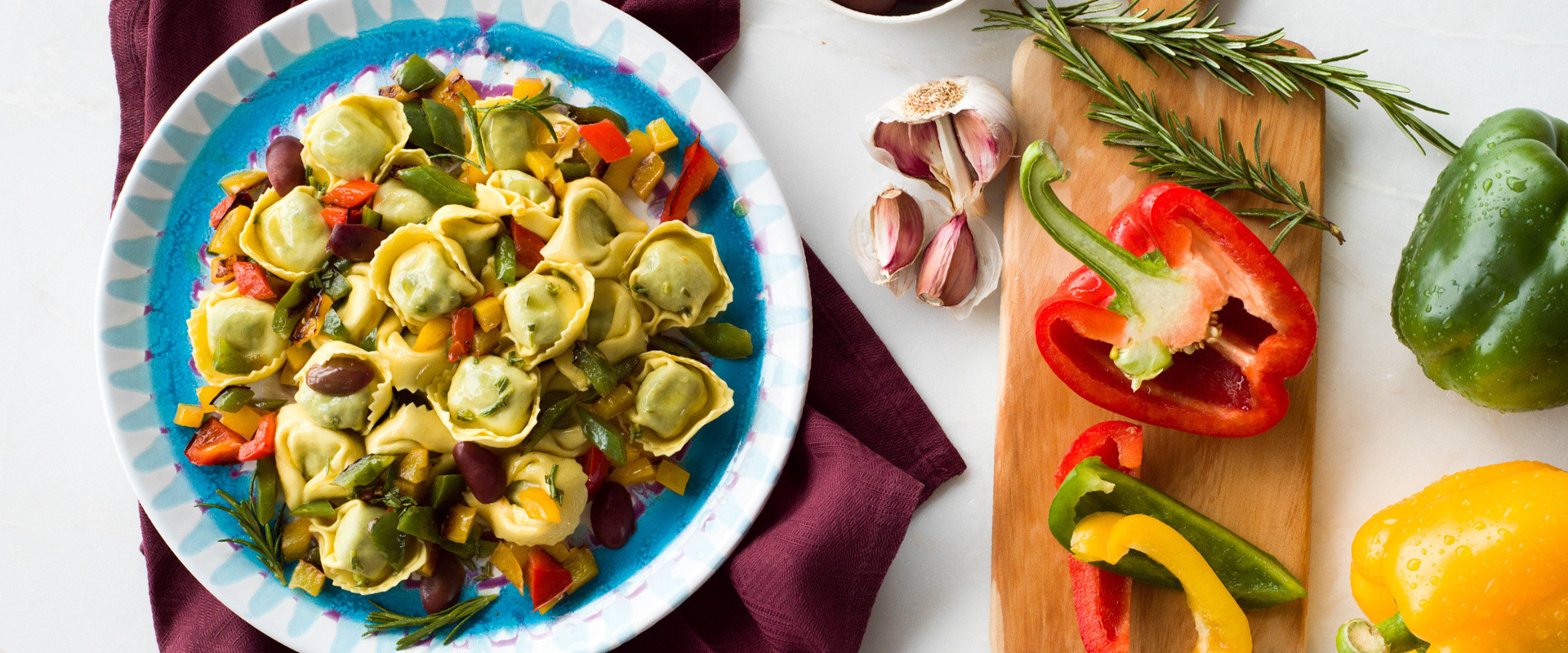 CHICKEN & SMOKED PANCETTA TORTELLONI WITH PEPPERS AND OLIVES La